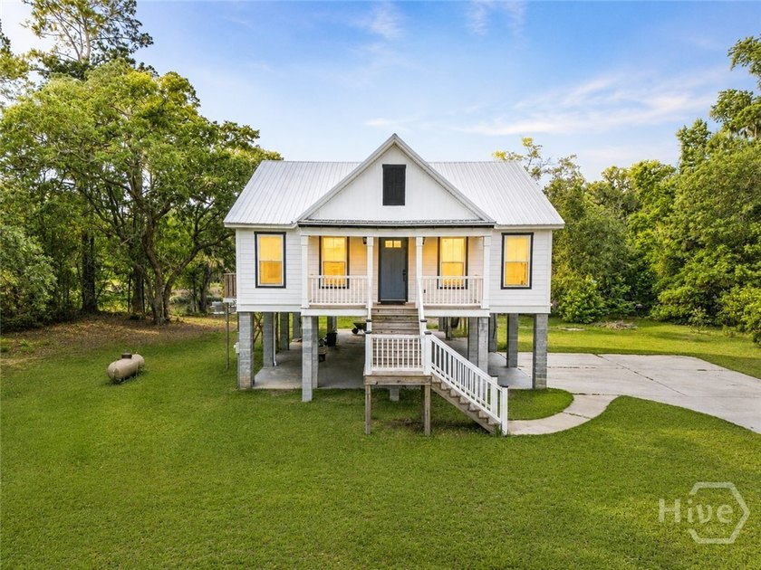 Welcome to coastal living at its finest at 425 Tideland Drive in - Beach Home for sale in Midway, Georgia on Beachhouse.com