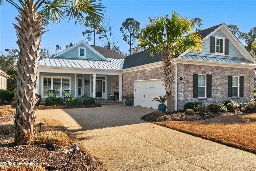 Located in the gated community of Compass Pointe in Leland, this - Beach Home for sale in Leland, North Carolina on Beachhouse.com