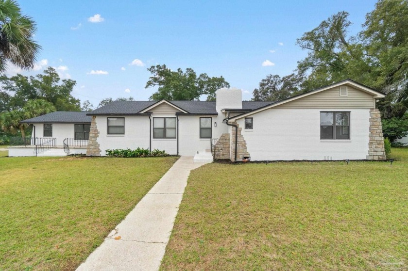 LARGE LOT, REMODELED, and SPACIOUS! Discover a harmonious blend - Beach Home for sale in Pensacola, Florida on Beachhouse.com