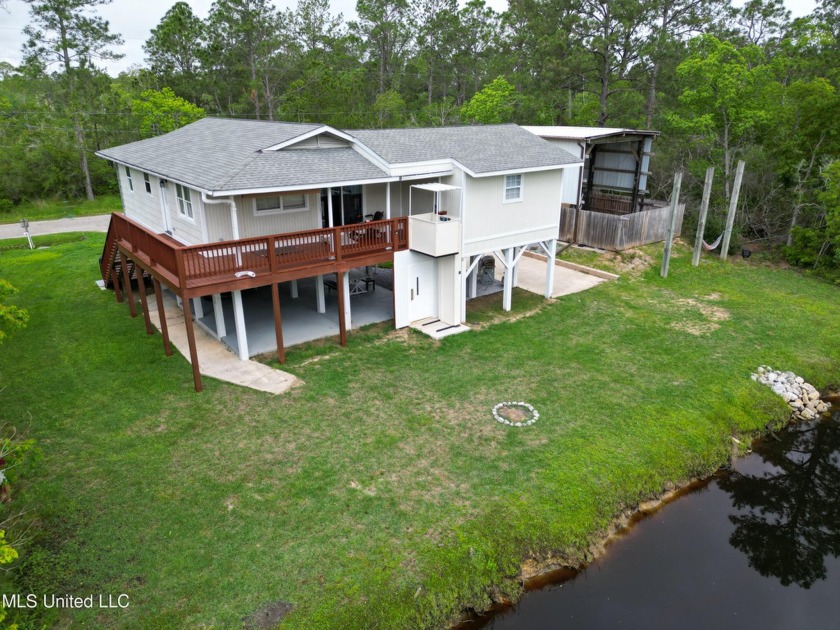 Beautifully remodeled raised home on the water in Bay St Louis - Beach Home for sale in Bay Saint Louis, Mississippi on Beachhouse.com