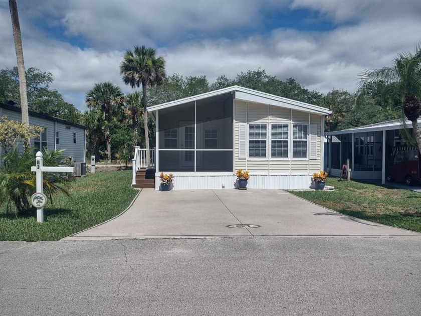 This immaculate 2 Bedroom/1.5 bath park home has 670 sq.ft. of - Beach Home for sale in Titusville, Florida on Beachhouse.com