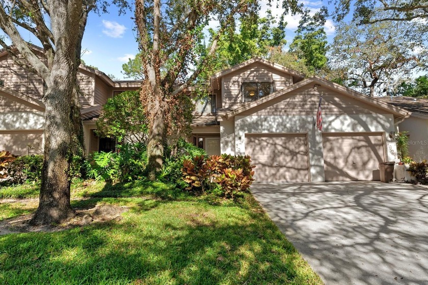 Completely Updated Townhome in Whispering Woods  Community with - Beach Townhome/Townhouse for sale in Tarpon Springs, Florida on Beachhouse.com