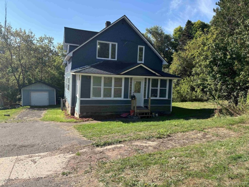 Nice 3 bedroom, 2+ bath home with one car garage and ample sized - Beach Home for sale in Ironwood, Michigan on Beachhouse.com