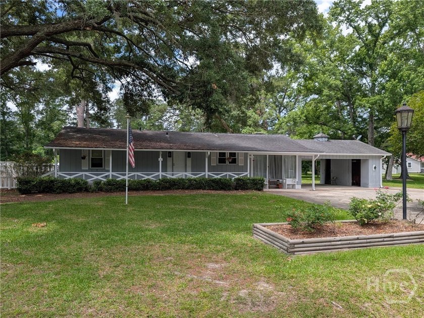 3 BEDROOM, 3 BATH LAKEFRONT HOME WITH DETACHED WORKSHOP/OFFICE - Beach Home for sale in Midway, Georgia on Beachhouse.com