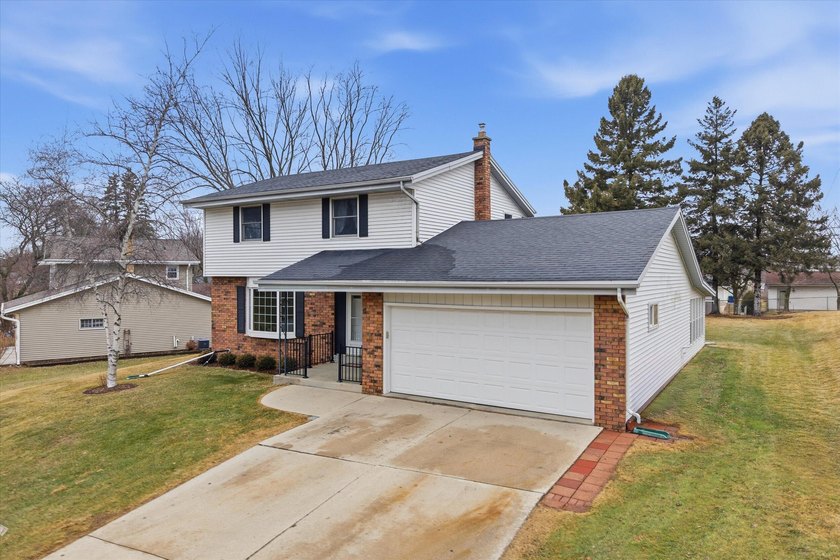 Welcome home to this lovingly maintained 4-bedroom colonial in - Beach Home for sale in Port Washington, Wisconsin on Beachhouse.com