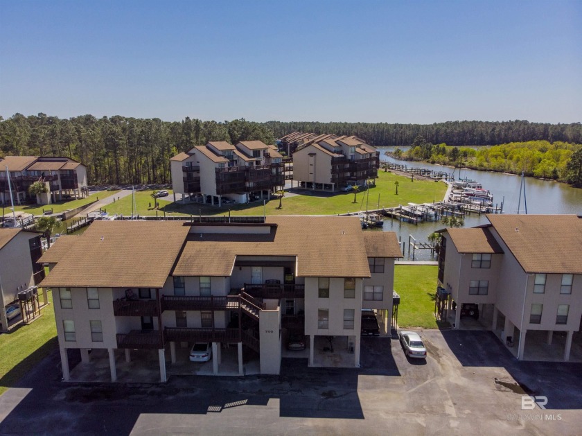 Looking for beautiful water views? Enjoy the quiet, gated - Beach Home for sale in Gulf Shores, Alabama on Beachhouse.com