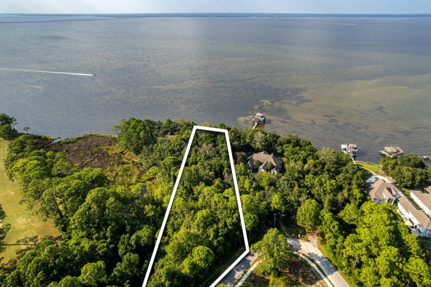 100 FEET OF  SHORELINE ON THE BAY. Enjoy pristine views - Beach Lot for sale in Miramar Beach, Florida on Beachhouse.com