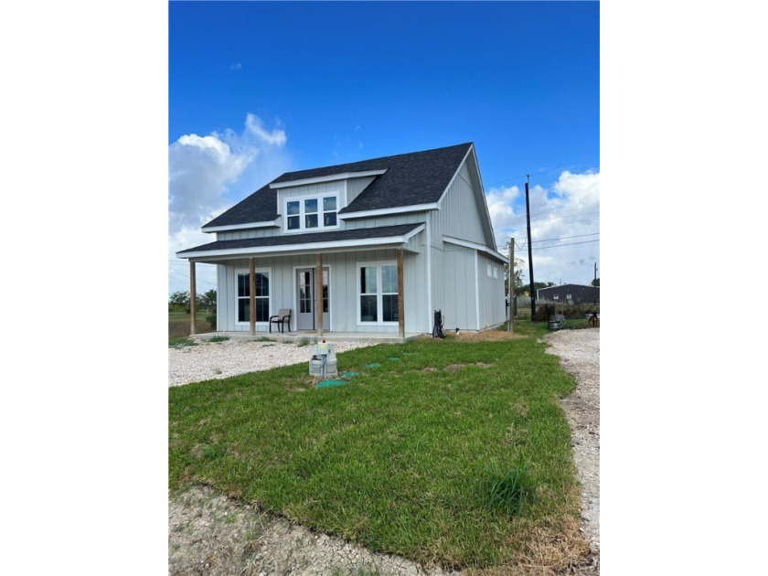 Experience custom craftsmanship and coastal charm in this - Beach Home for sale in Rockport, Texas on Beachhouse.com
