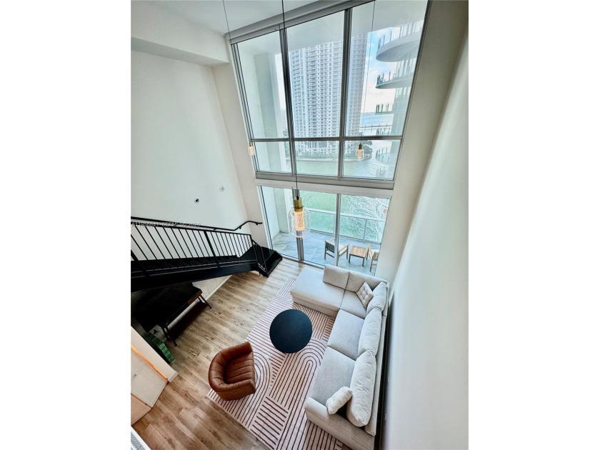 Wake up to water views and natural light pouring through 20-foot - Beach Condo for sale in Miami, Florida on Beachhouse.com