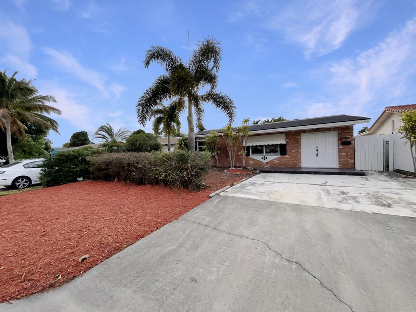 Welcome to 3765 NE 12th Ter, a property that boasts a range of - Beach Home for sale in Pompano Beach, Florida on Beachhouse.com