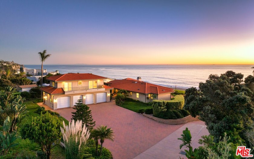 Set atop approximately 1.6 acres along the coveted Zuma Bluffs - Beach Home for sale in Malibu, California on Beachhouse.com