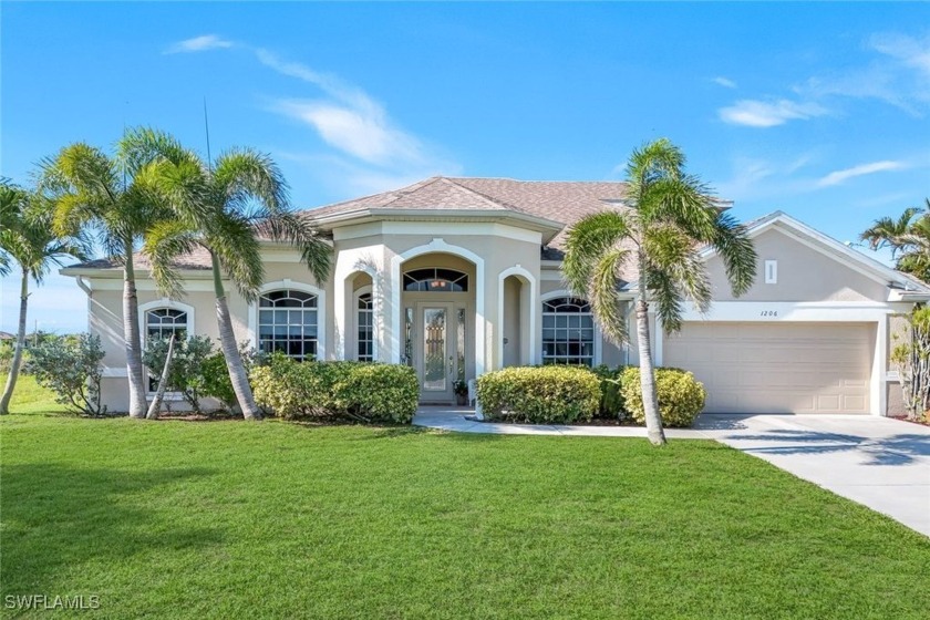 Spacious 4-Bedroom David Weekley Pool Home with Wide Canal Views - Beach Home for sale in Cape Coral, Florida on Beachhouse.com