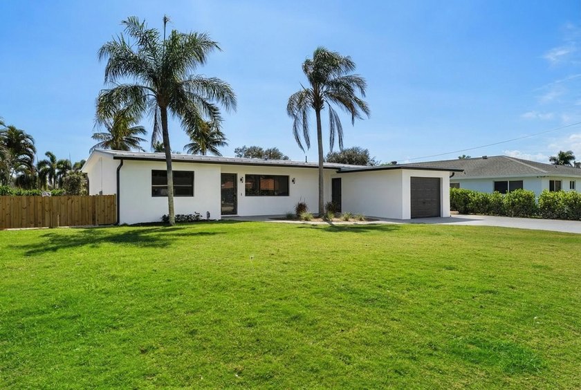 Welcome to this extensively renovated 3-bedroom, 2-bathroom - Beach Home for sale in Lake Clarke Shores, Florida on Beachhouse.com
