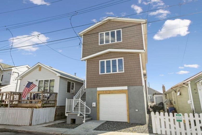 RENT OR BUY THIS FULLY ELEVATED REMODELED WATERFRONT HOME in - Beach Home for sale in Broad Channel, New York on Beachhouse.com