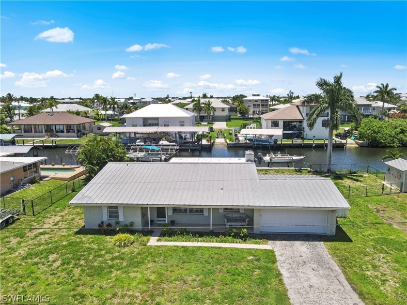 LOCATION! LOCATION! LOCATED IN PIRATE HARBOR WHERE THE FISHING & - Beach Home for sale in Punta Gorda, Florida on Beachhouse.com