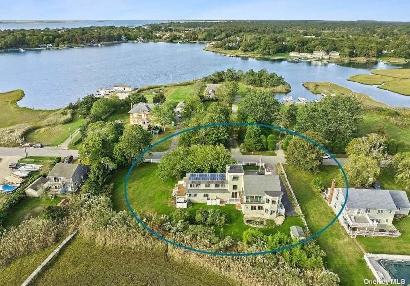 Impeccably renovated from top to bottom, this stylish - Beach Home for sale in East Moriches, New York on Beachhouse.com