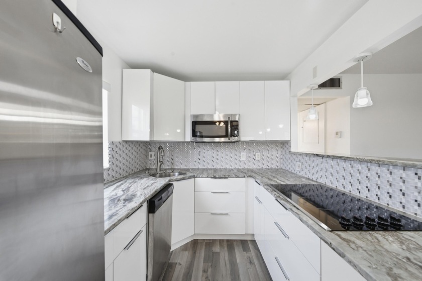 Welcome to 97 Saxony C, a spacious 2-bedroom, 2-bath TRUE corner - Beach Condo for sale in Delray Beach, Florida on Beachhouse.com