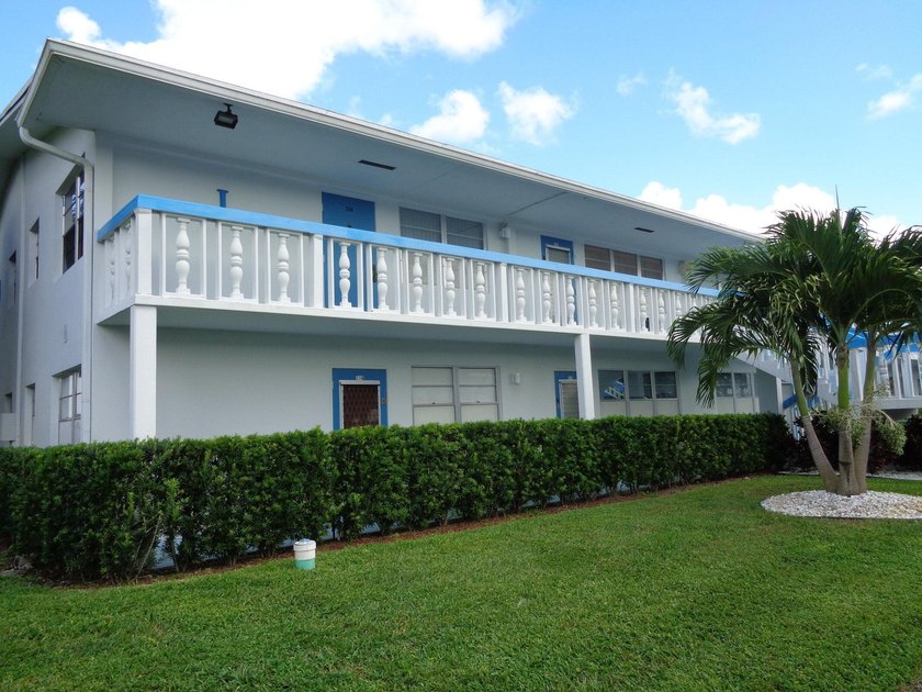 Bright second-floor corner unit featuring 2 bedrooms and 1.5 - Beach Condo for sale in Deerfield Beach, Florida on Beachhouse.com