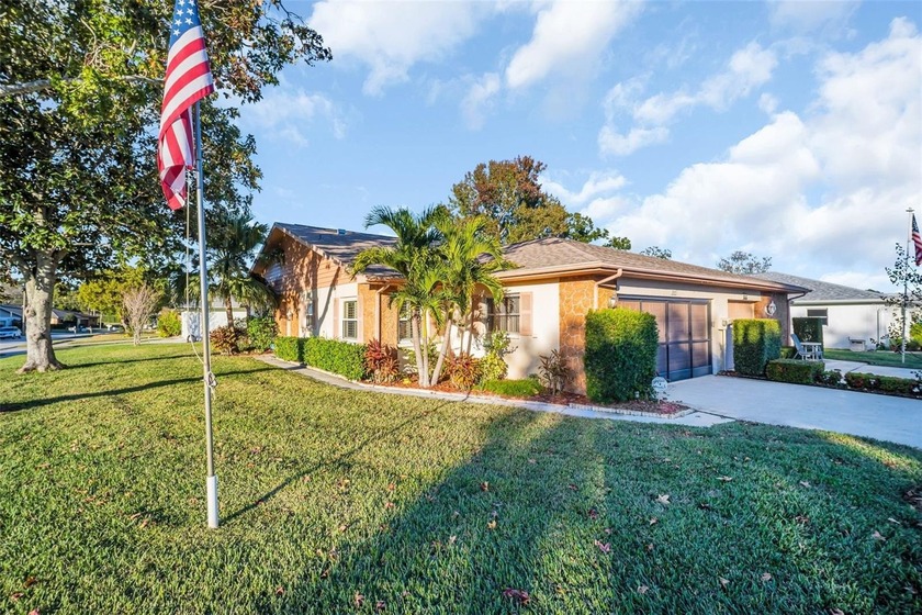 Welcome to this beautiful Duplex Village II villa located within - Beach Home for sale in Palm Harbor, Florida on Beachhouse.com