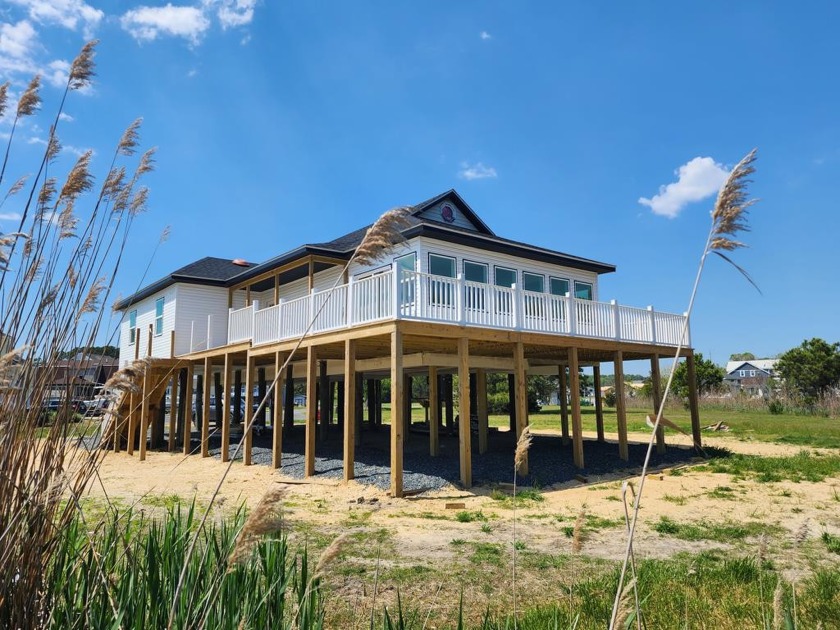 This home is a complete stunner! 3335 Harpoon Court is situated - Beach Home for sale in Greenbackville, Virginia on Beachhouse.com