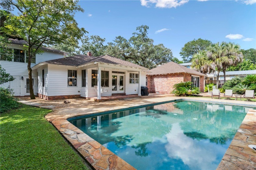 Tucked on a quiet street in the heart of the Village, this warm - Beach Home for sale in Saint Simons, Georgia on Beachhouse.com
