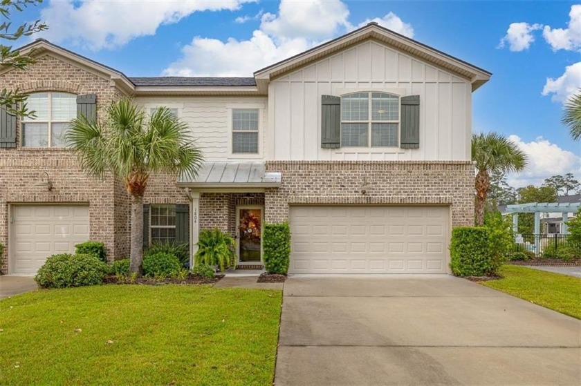 Don't miss this rare end-unit home with a 2-car garage and - Beach Townhome/Townhouse for sale in Saint Simons, Georgia on Beachhouse.com