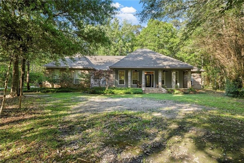 This exceptional custom built estate (succession property) - Beach Home for sale in Slidell, Louisiana on Beachhouse.com