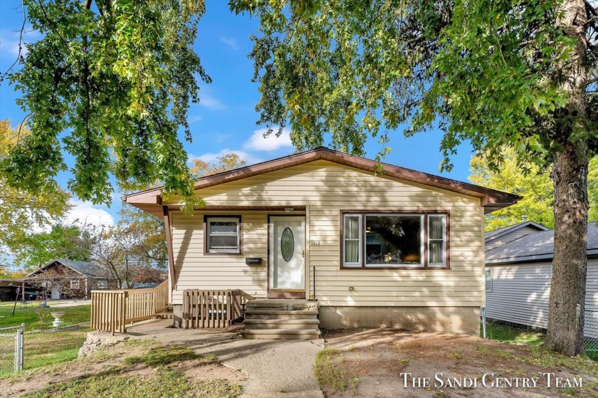 This beautifully updated ranch-style home features 4 bedrooms, 2 - Beach Home for sale in Muskegon, Michigan on Beachhouse.com