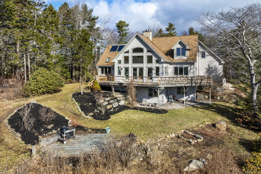 Panoramic, elevated southeasterly views of wooded surroundings - Beach Home for sale in Harpswell, Maine on Beachhouse.com
