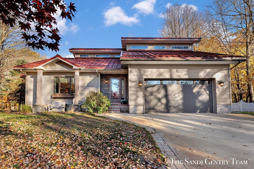 Architectural Strength Meets Natural Serenity Tucked away at the - Beach Home for sale in Norton Shores, Michigan on Beachhouse.com