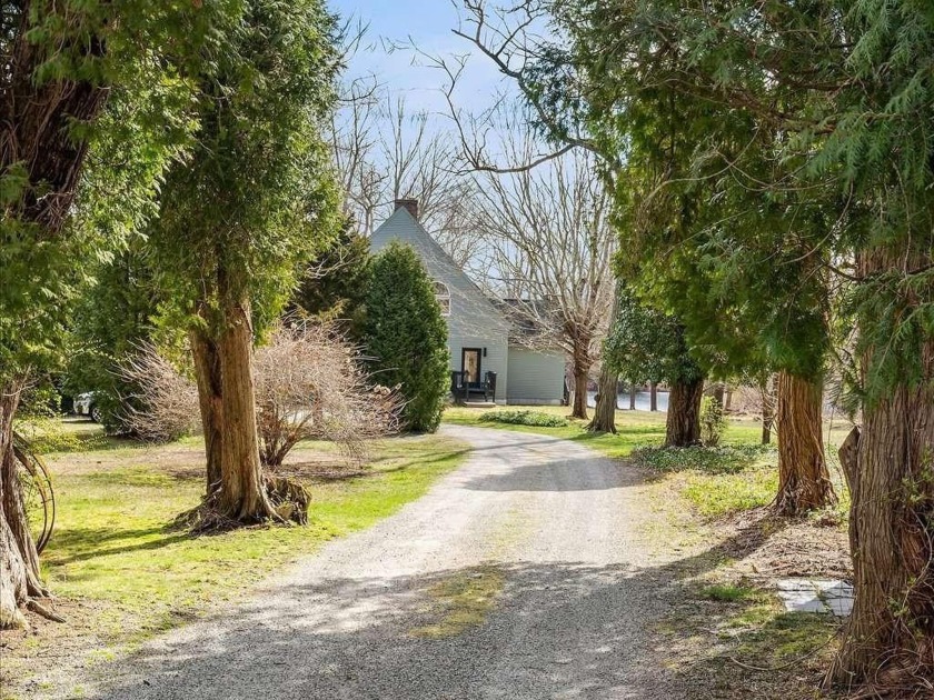 Nestled on a serene 1.5-acre lot, discover this 3-bedroom, 2 - Beach Home for sale in Charlestown, Rhode Island on Beachhouse.com