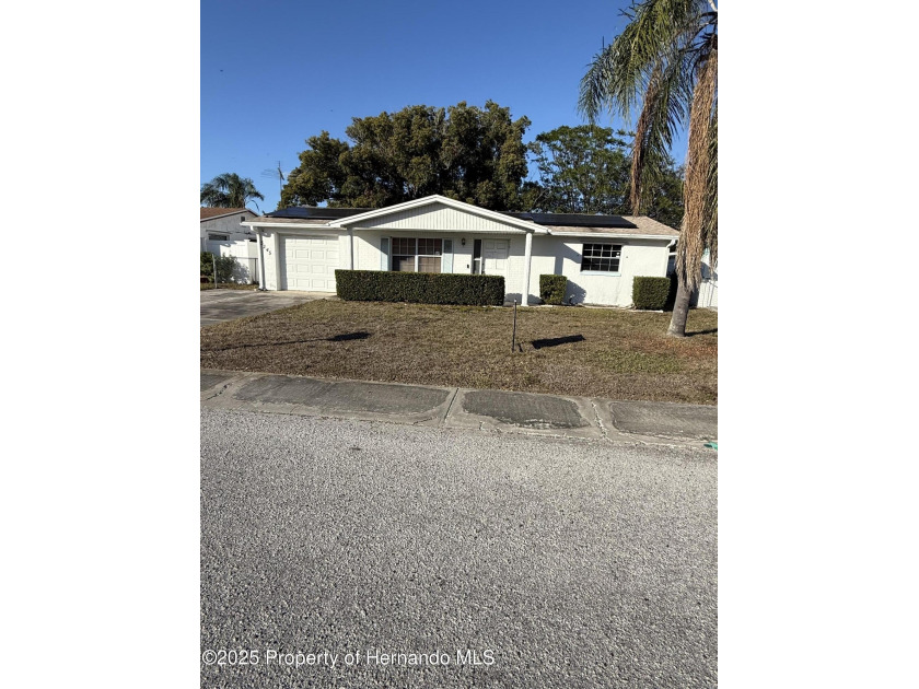 This home is full of potential and charm, perfectly situated - Beach Home for sale in Holiday, Florida on Beachhouse.com