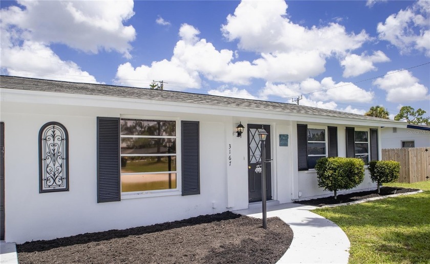 Amazing heated POOL home in a quiet neighborhood and desirable - Beach Home for sale in Port Charlotte, Florida on Beachhouse.com