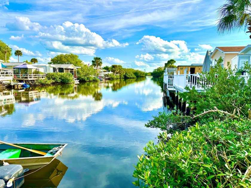 21+/SALT WATER CANAL/DECK ON WATER/MANATEES/DOLPHINS/FISHING - Beach Home for sale in Ruskin, Florida on Beachhouse.com