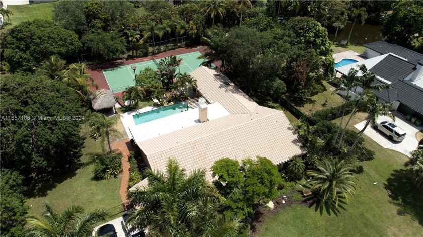 CASA DE AMOR... TENNIS ANYONE OR CONVERT TO PICKLE BALL COURT - Beach Home for sale in Davie, Florida on Beachhouse.com