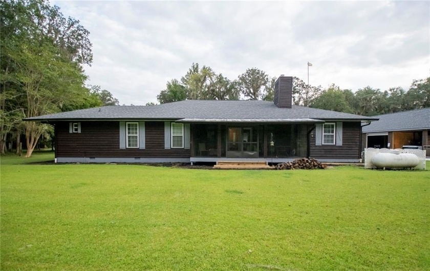 Main Estate 2746 Sqr FT
Rental Unit 650 Sqr Ft
Enclosed Shop - Beach Home for sale in Woodbine, Georgia on Beachhouse.com