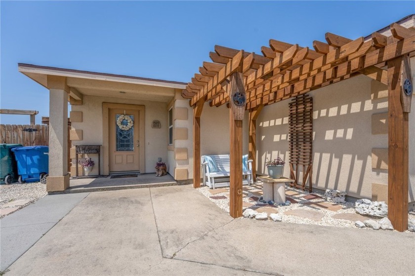 Enjoy breathtaking waterfront views from this well-maintained - Beach Home for sale in Corpus Christi, Texas on Beachhouse.com