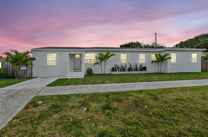 Totally Renovated!!! Step into a beautifully updated retreat - Beach Home for sale in West Palm Beach, Florida on Beachhouse.com