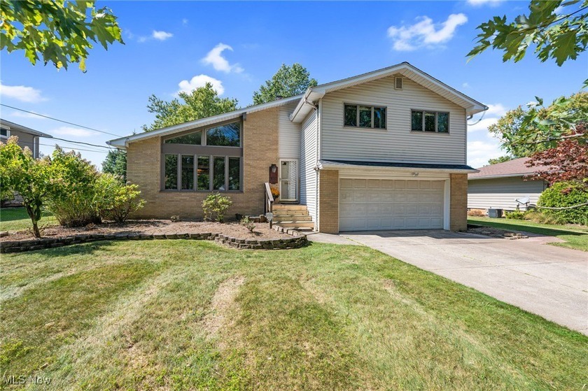 Step into this mid-century split-level gem in Highland Heights - Beach Home for sale in Cleveland, Ohio on Beachhouse.com