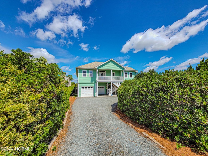 Welcome to 3539 Island Drive, a stunning sound-front home tucked - Beach Home for sale in North Topsail Beach, North Carolina on Beachhouse.com