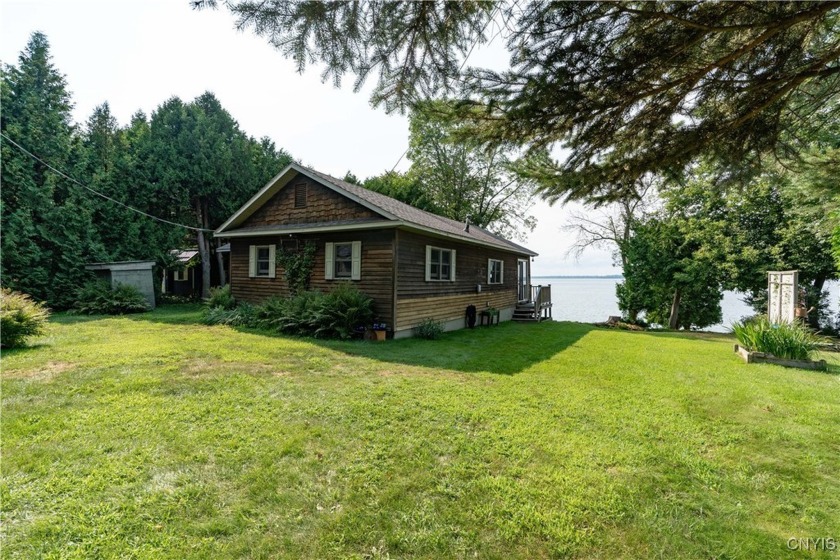 Leave the hustle and bustle behind and savor the peace and - Beach Home for sale in Cape Vincent, New York on Beachhouse.com