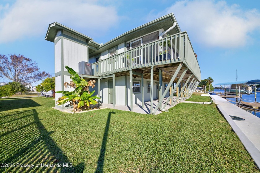 AMAZING INVESTMENT OPPORTUNITY! WATERFRONT GULF-ACCESS TROPICAL - Beach Home for sale in Hernando Beach, Florida on Beachhouse.com