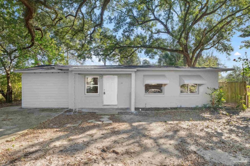 Adorable 4 bedroom, 2 bath home with new LVP flooring and fresh - Beach Home for sale in Pensacola, Florida on Beachhouse.com