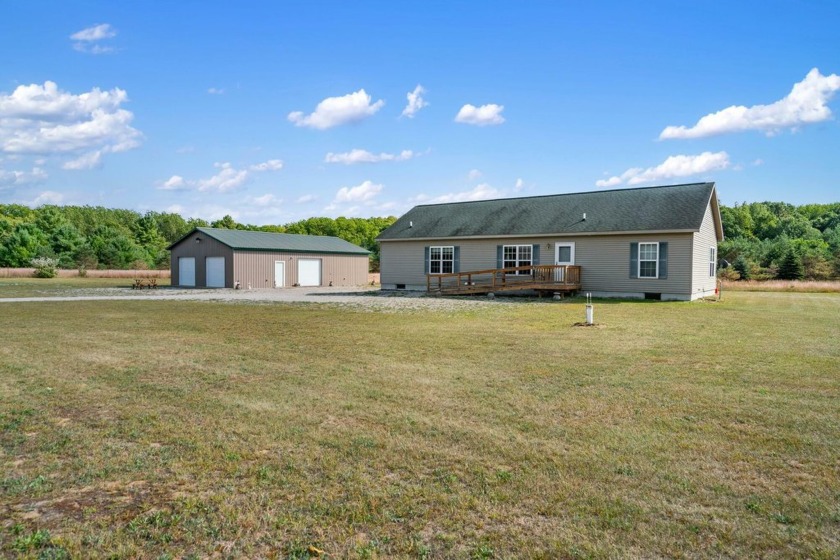 This well-cared-for 4-bedroom, 2 bath home is nestled in a - Beach Home for sale in Cheboygan, Michigan on Beachhouse.com