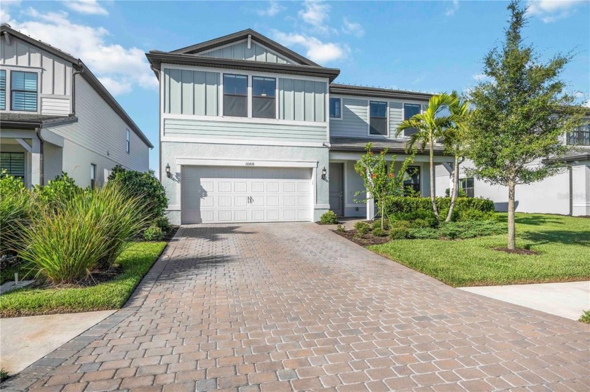Welcome to this beautifully designed 4-bedroom, 3.5-bath home in - Beach Home for sale in Lakewood Ranch, Florida on Beachhouse.com