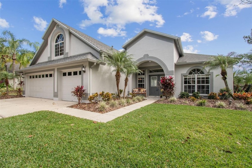 Enjoy serene WATERFRONT LIVING in this beautifully updated home - Beach Home for sale in Tampa, Florida on Beachhouse.com