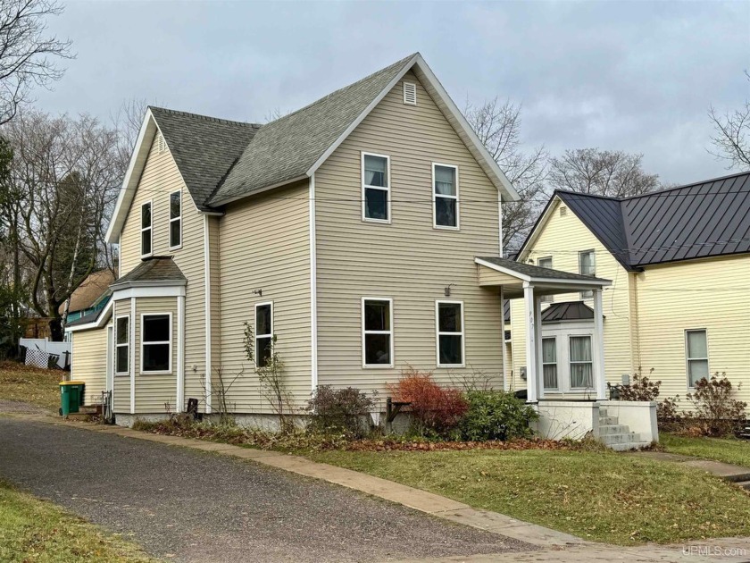 This 3-bedroom, 1.5-bath home offers the perfect blend of - Beach Home for sale in Marquette, Michigan on Beachhouse.com