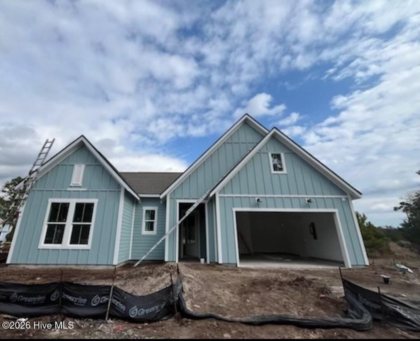 This stunning 3-bedroom, 2.5-bath home offers modern living at - Beach Home for sale in Shallotte, North Carolina on Beachhouse.com
