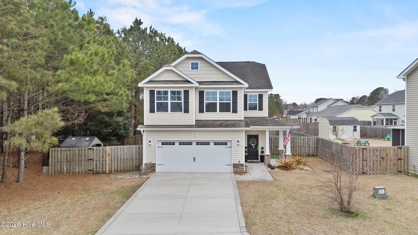 Welcome to this beautifully maintained two-story home tucked - Beach Home for sale in Hampstead, North Carolina on Beachhouse.com