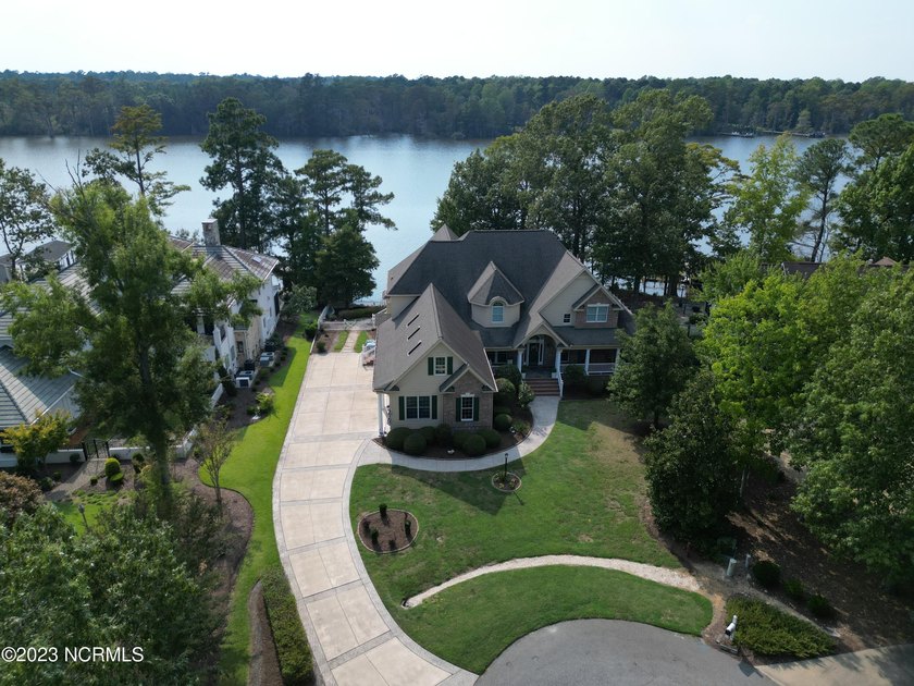 Exquisite riverfront custom home, located in the highly sought - Beach Home for sale in Hertford, North Carolina on Beachhouse.com